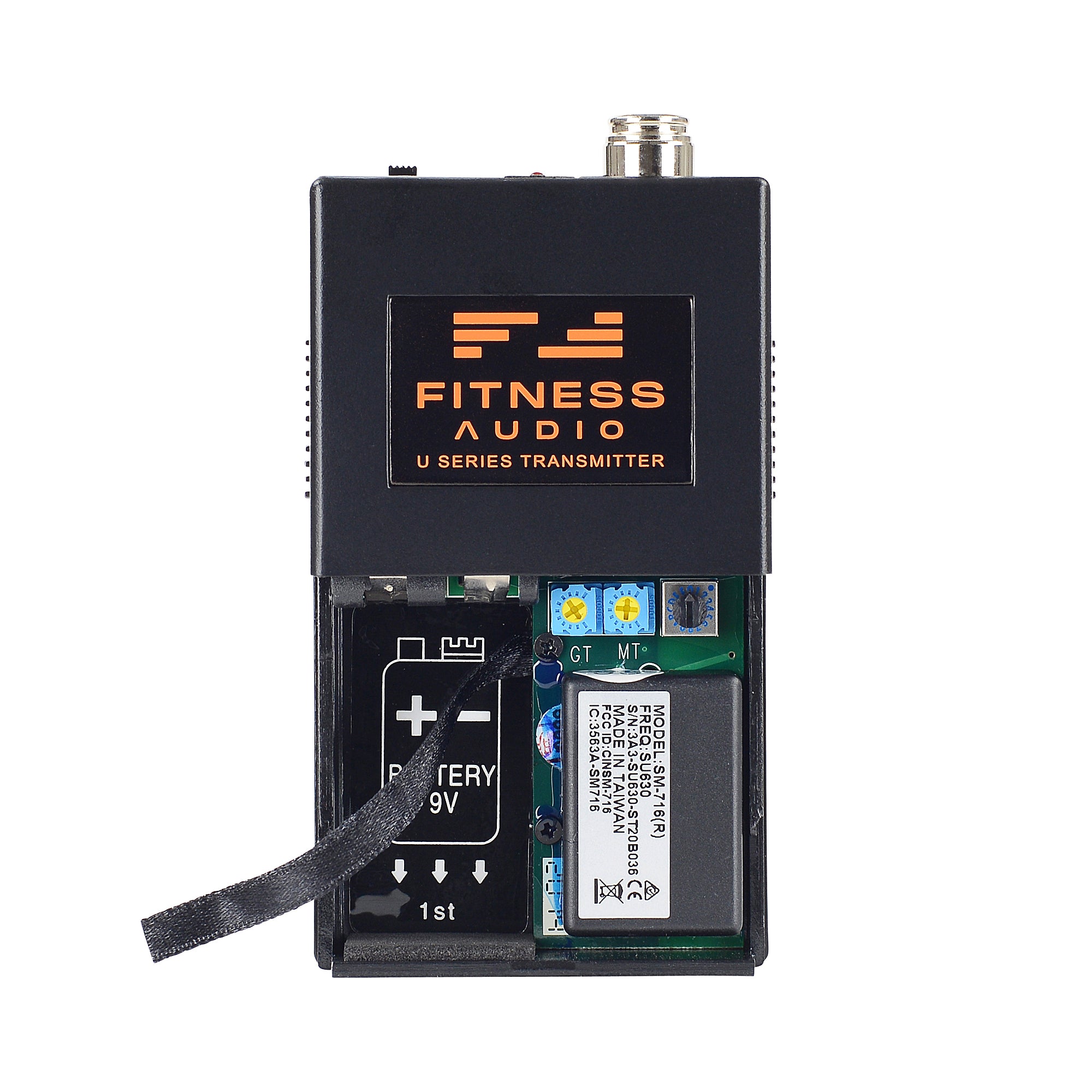 The Fitness Audio U-Series transmitter with its front panel open to show the internal battery compartment and settings controls.